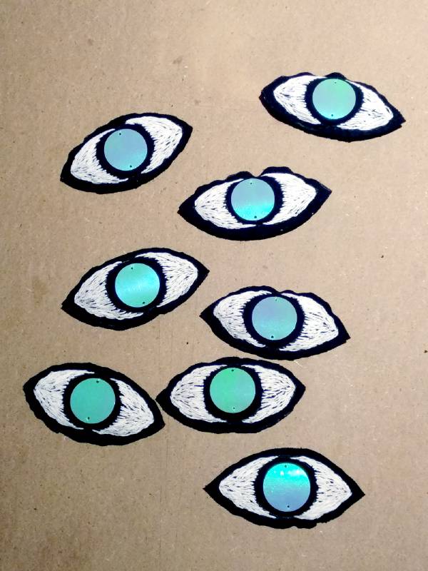 occhi paillettes ricamati a mano a